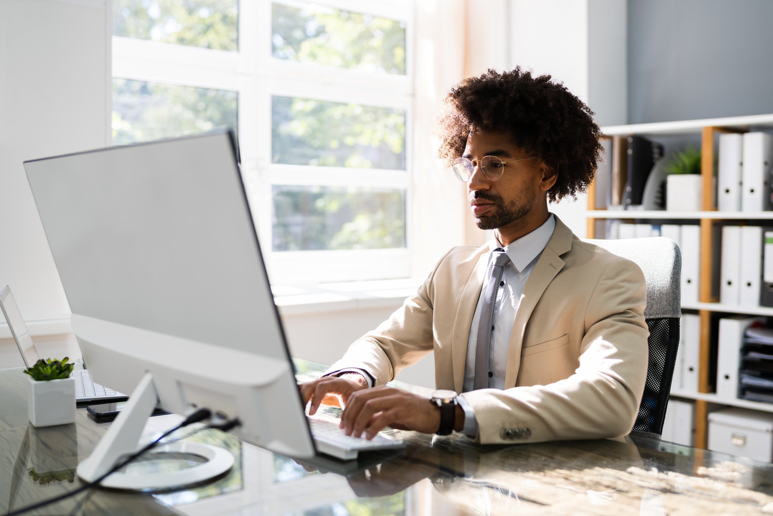 African American Business Man Using Computer